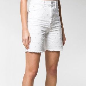 Isabel Marant Etoile rip motif high-waisted cut-off white denim shorts. 🤍
